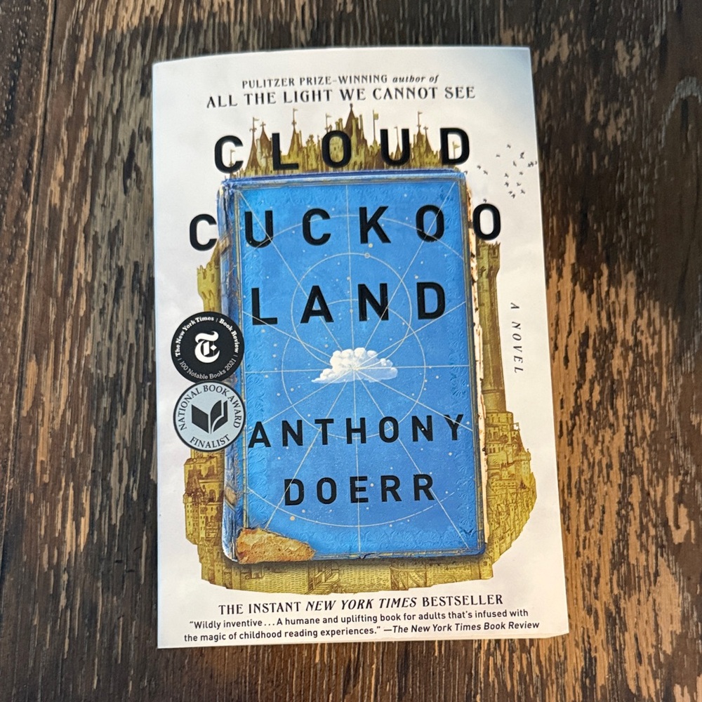 Cloud Cuckoo Land Paperback by Anthony Doerr - Blue & White Cover